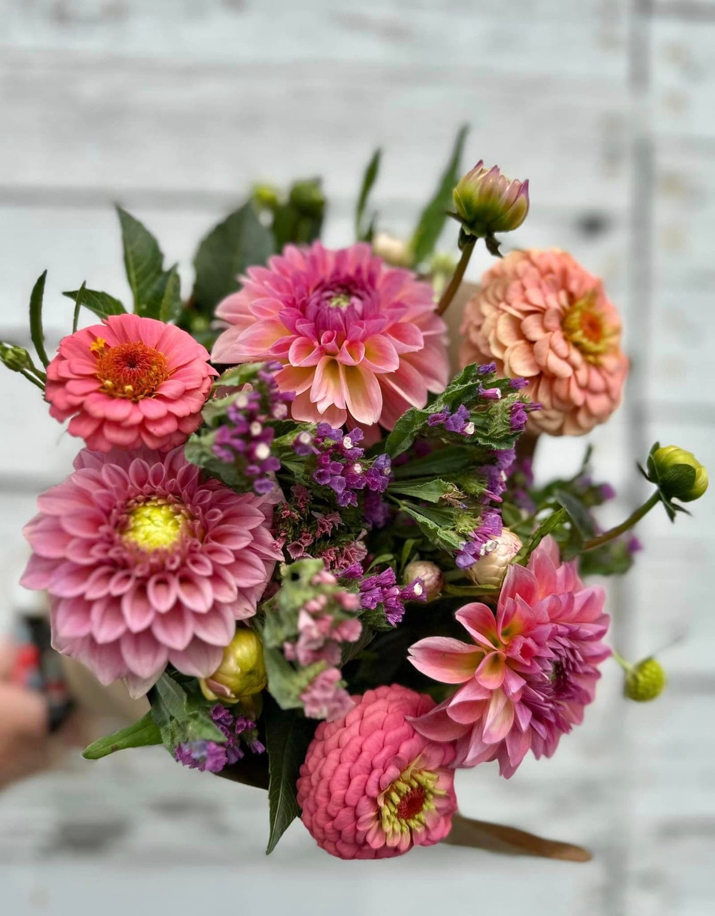 A colorful mixed bouquet in a clear glass vase